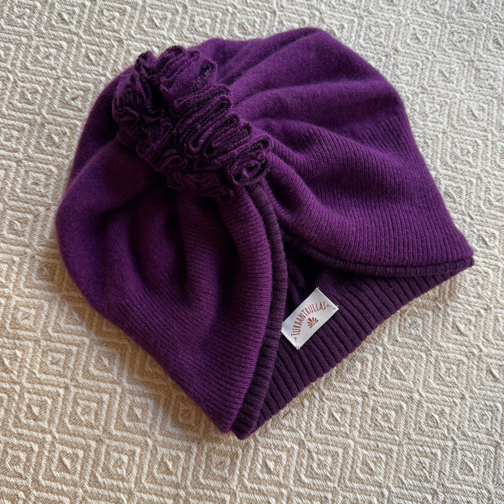 
                      
                        NEU: Upcycling Turbane Violett
                      
                    
